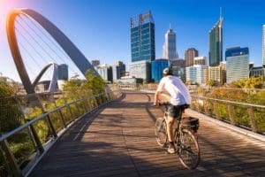 Cyclist riding accross The Elizabeth Bridge in inner Perth.