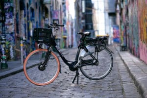 A Ride Kola bike parked in city laneway