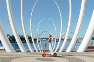 Person riding e-scooter in Perth