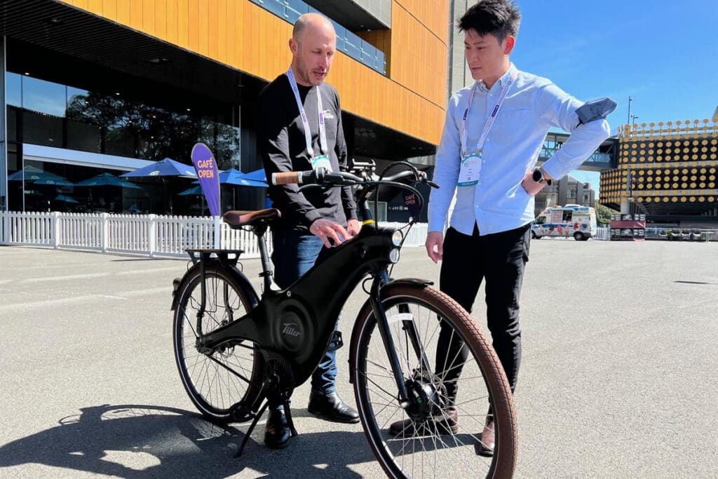 Two people looking at Tiller e-bike