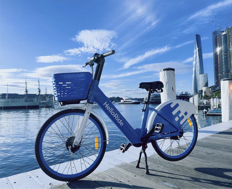 Product shot of ebike with city background