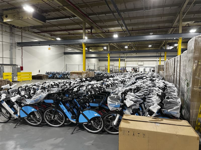E-bike share service warehouse full of e-bikes