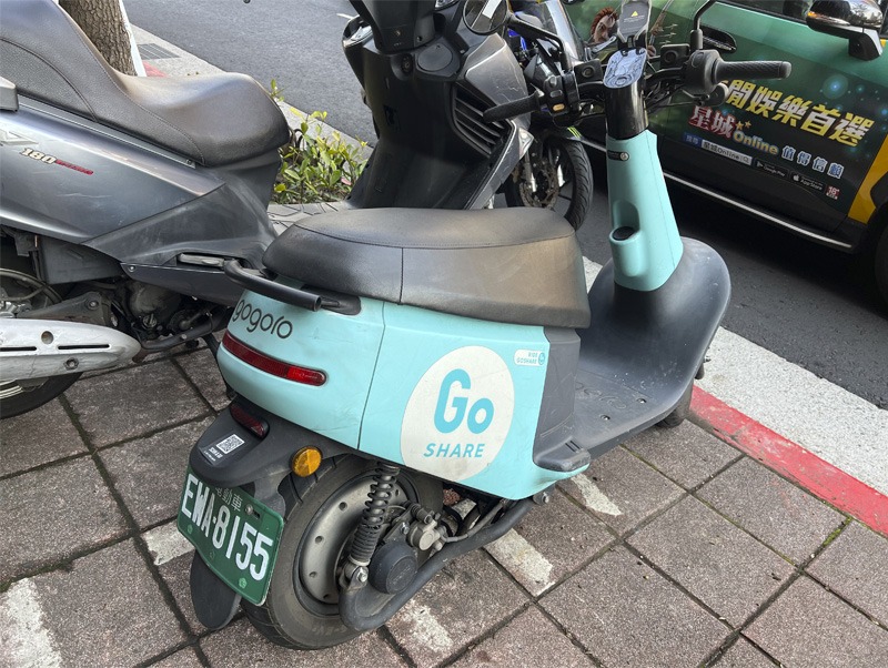 Share scheme e-moped parked on the street