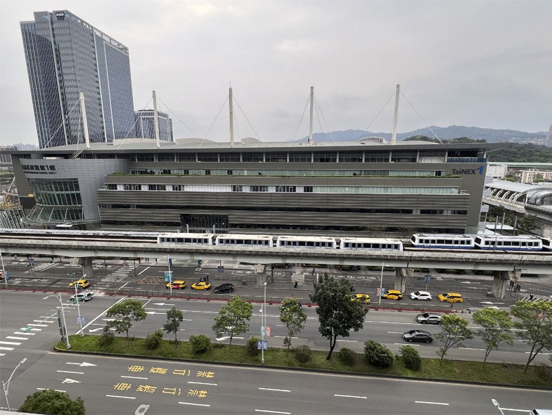 Exterior view of Nangang Exhibition Centre with metro lines