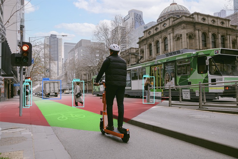 Person riding e-scooter in the city