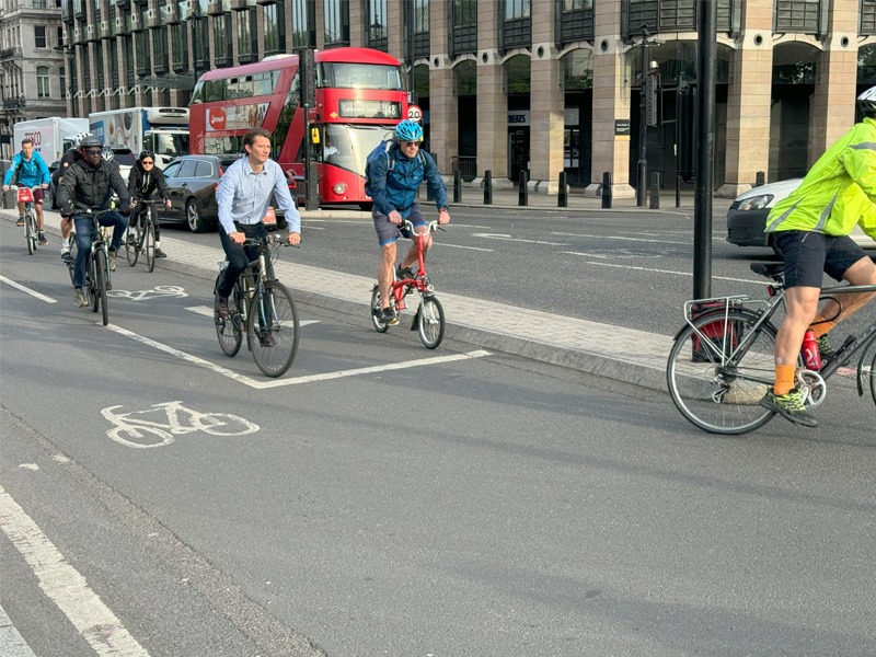 People cycling on street