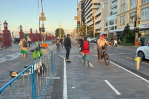 People riding bikes on shared path.