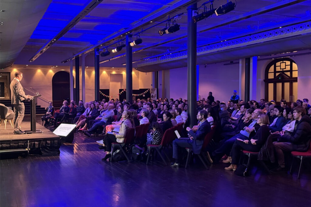 Conference room with speaker in front of audience