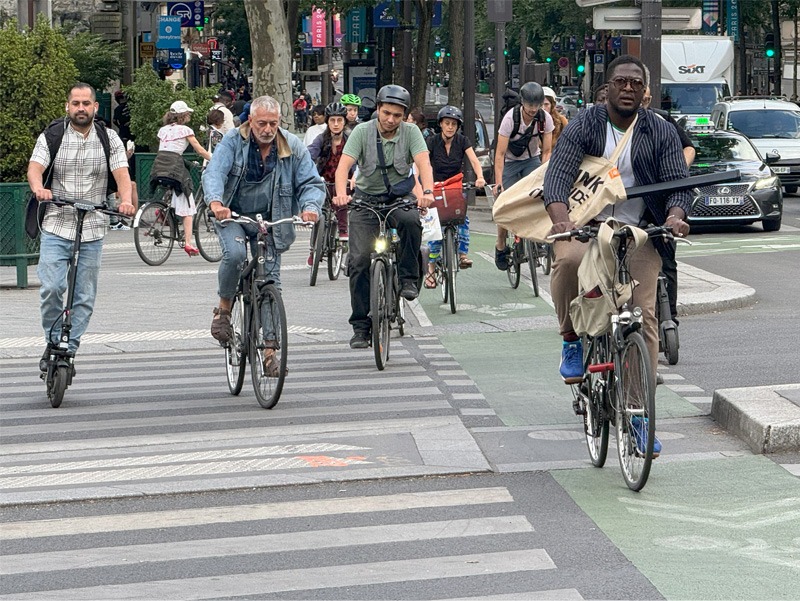 cyclists riding on a cycling path.