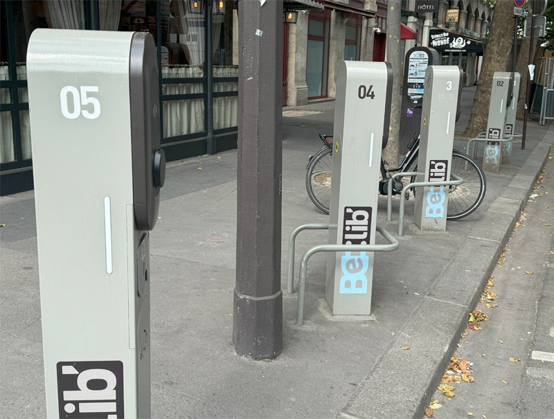 Public e-bike charging station on street.