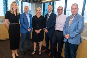 Group of professional people standing for portrait